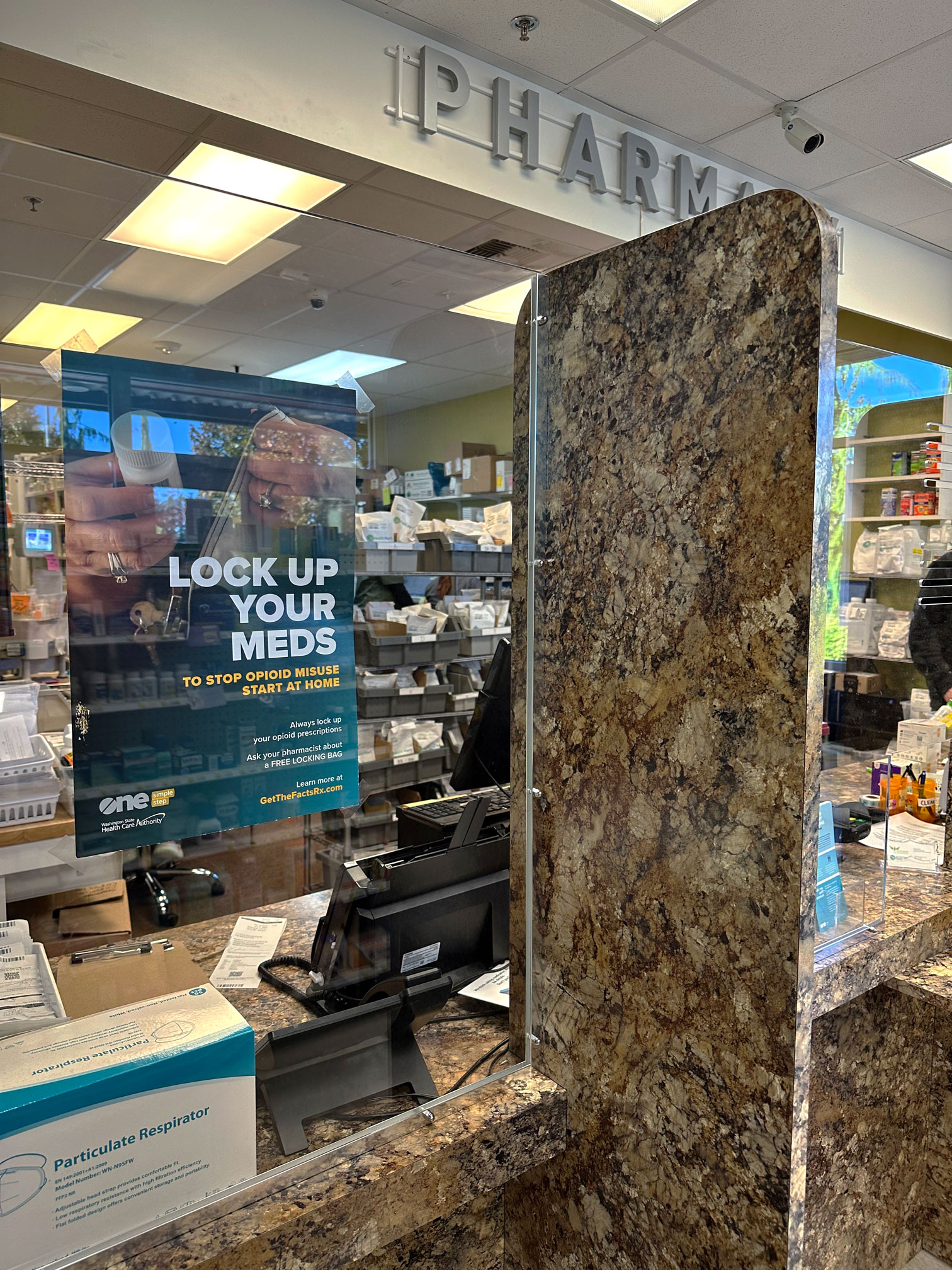 WSHA Poster on a pharmacy window.